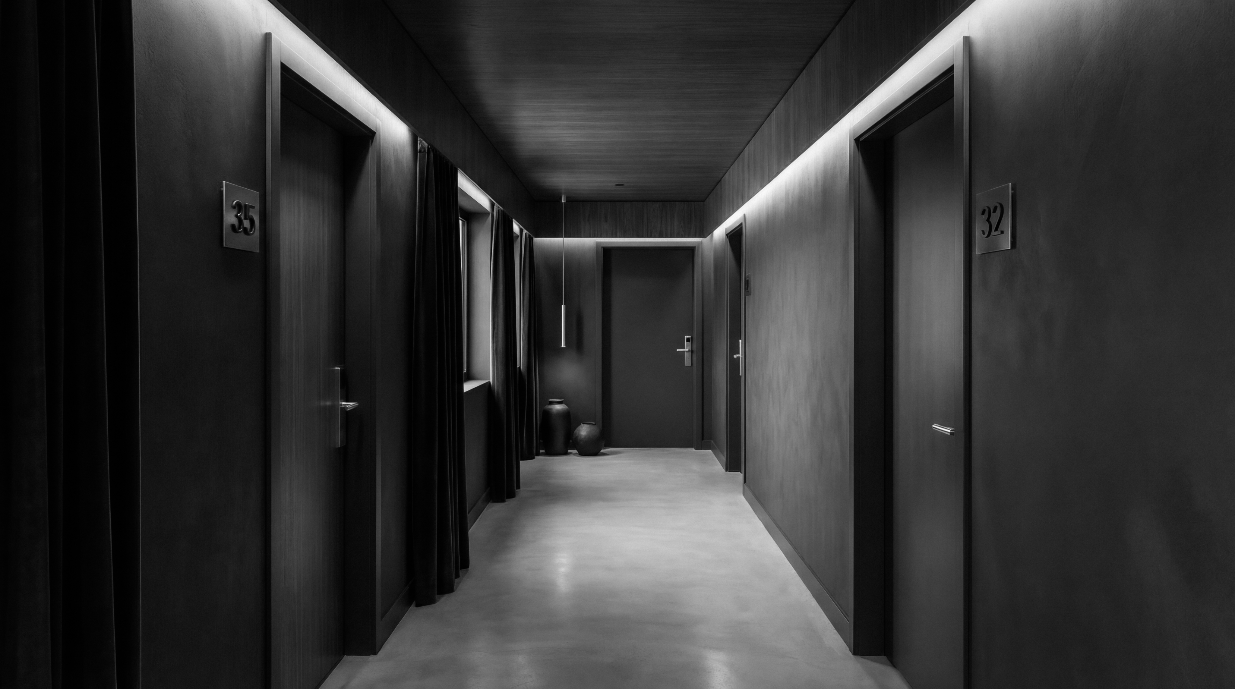 Photo of a study hall with wooden tables and chairs.